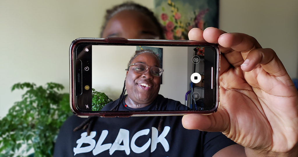 Woman recording a selfie video