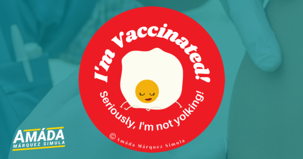 Red button pin with a smiling fried egg that reads I'm vaccinated! Seriously, I'm not yolking!