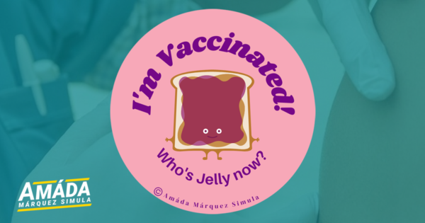 Pink button pin with a smiling piece of toast with jelly that reads I'm vaccinated! Who's Jelly now?