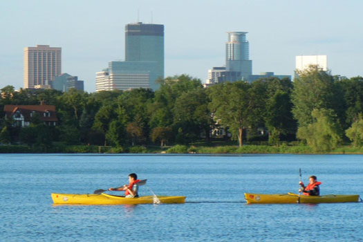 clean_water_MN Kayaks paddling on clean waters near a Minnesota city