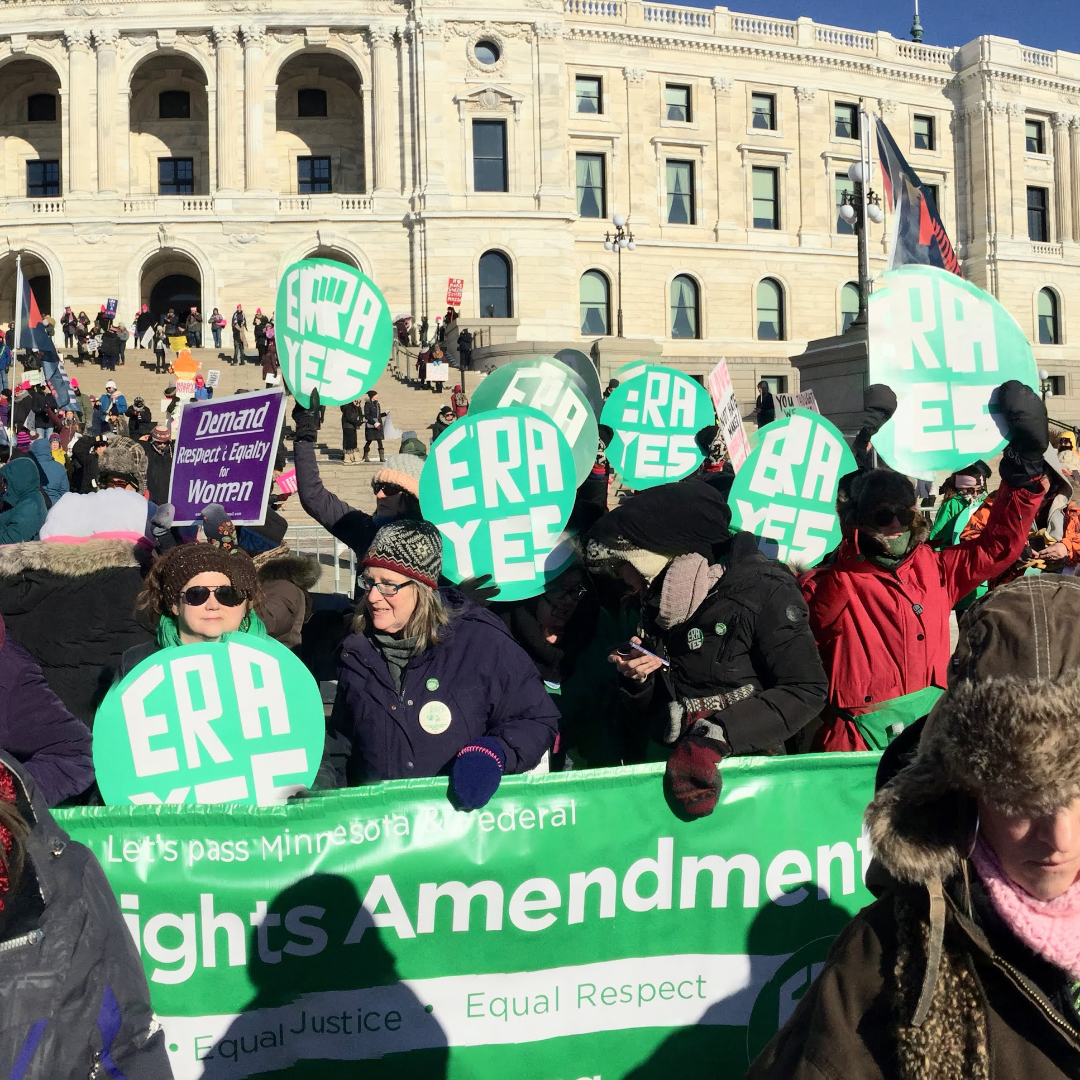 Activists supporting the ERA outside the Minnesota State Capitol during the Women's March in January 2019.