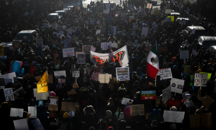 Protesters denounce political violence on Friday, Jan. 23, 2026, in Minneapolis, Minnesota.